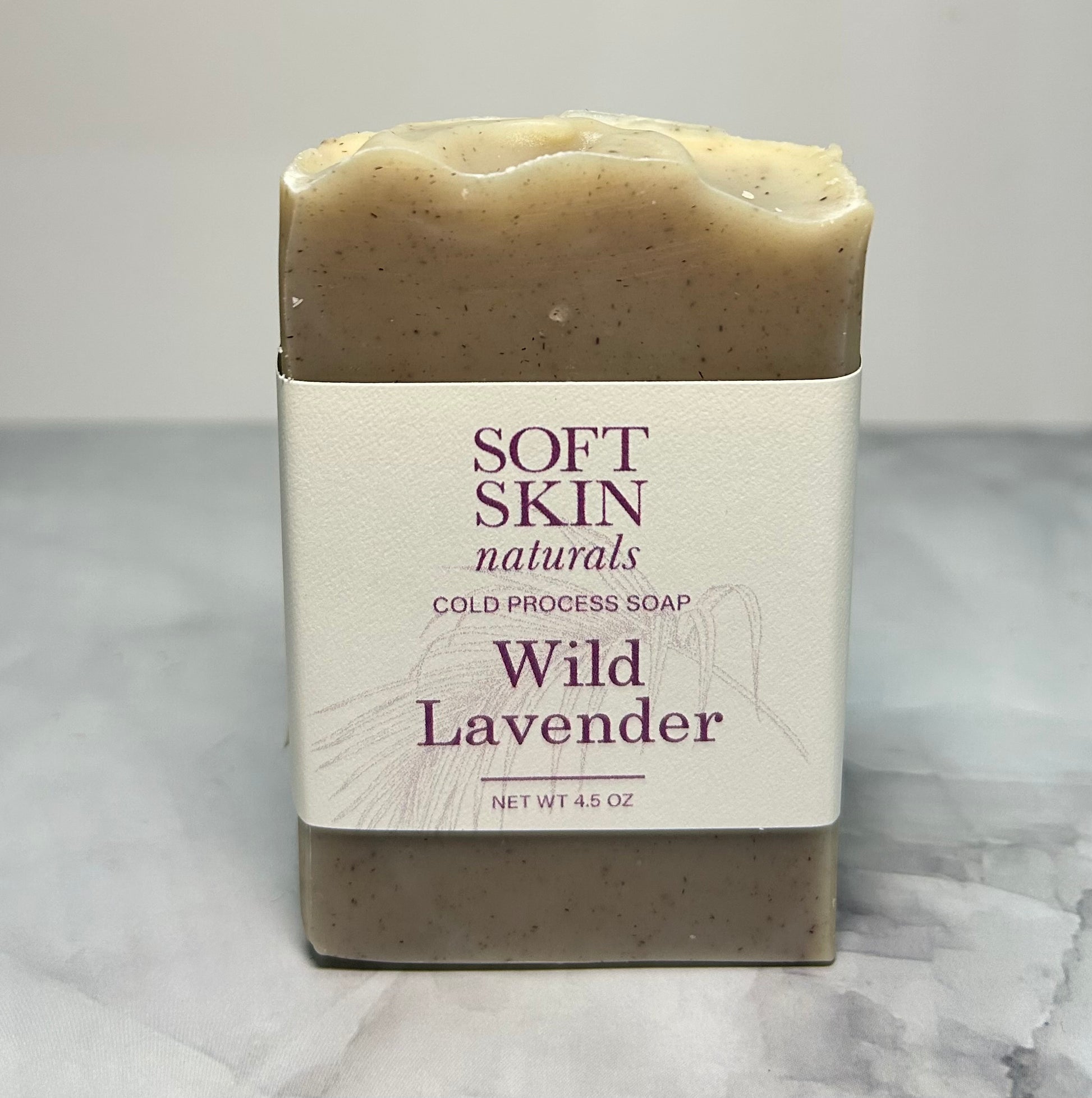 Bar of Wild Lavender soap from Soft Skin Naturals on a marble surface