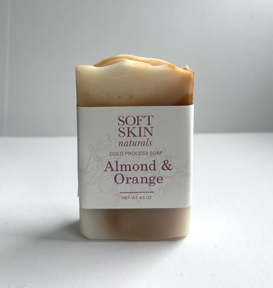 Bar of soap with Soft Skin Naturals label on a white background