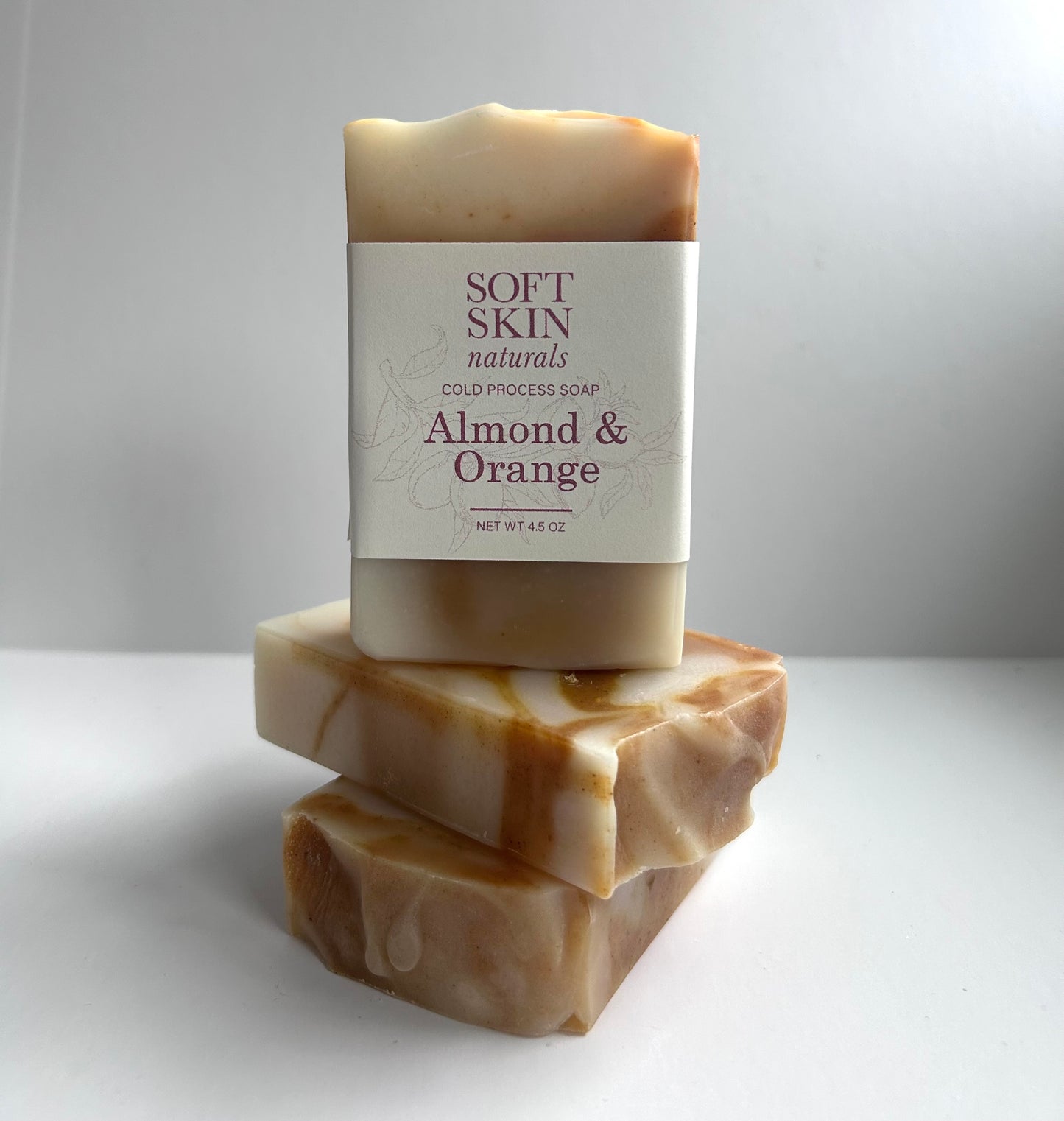Bar of soap with Soft Skin Naturals label on a white background