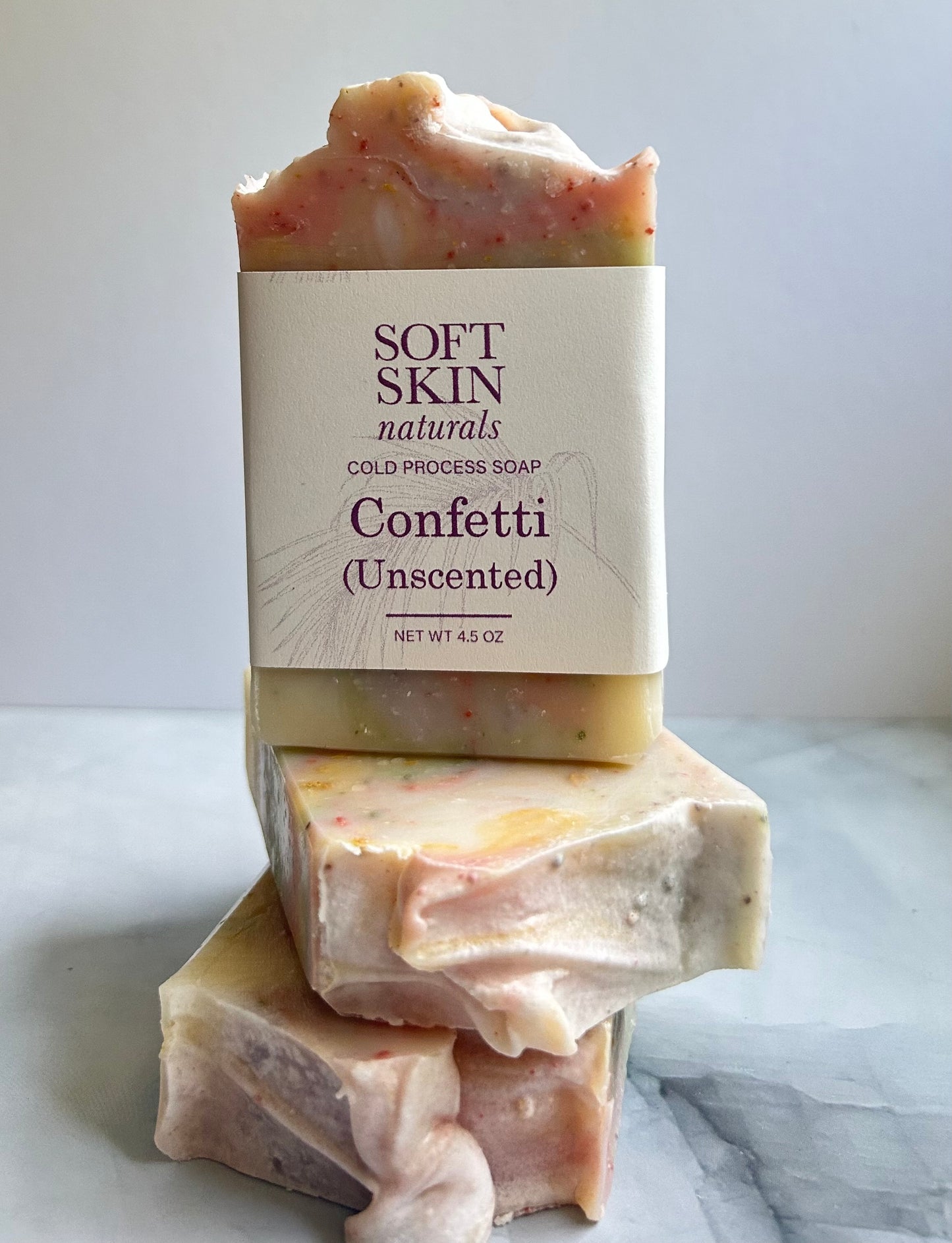 Three milti colored bars of soap