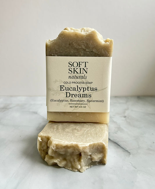 Bar of soap with a label on a marble surface