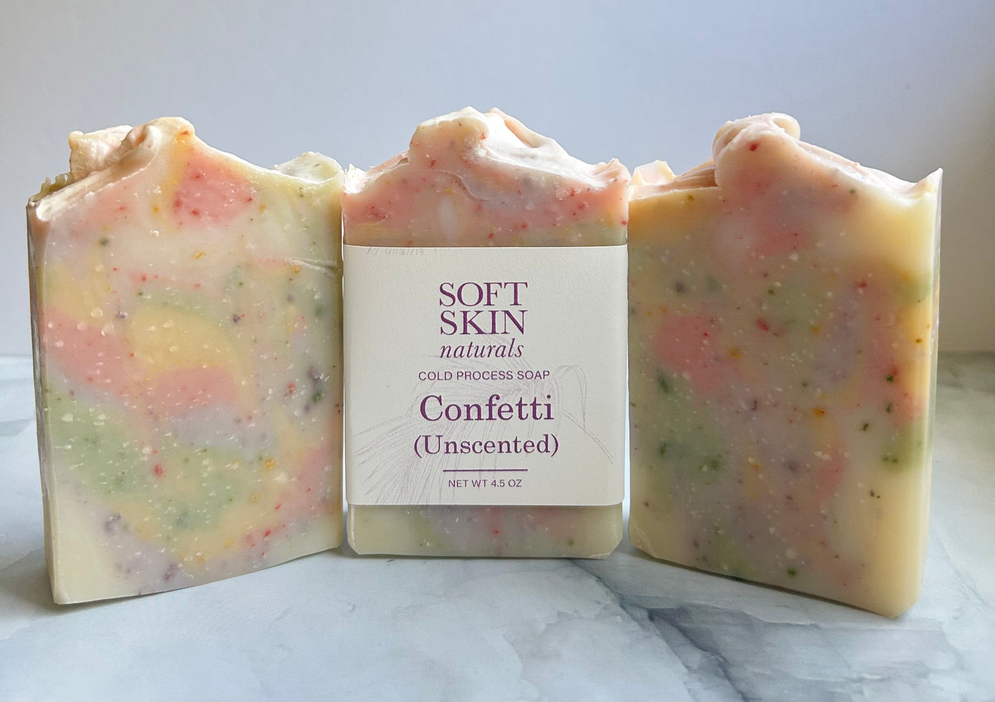 Three multi colored soaps