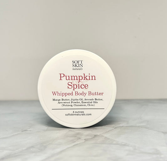 Pumpkin Spice whipped body butter container on a gray background