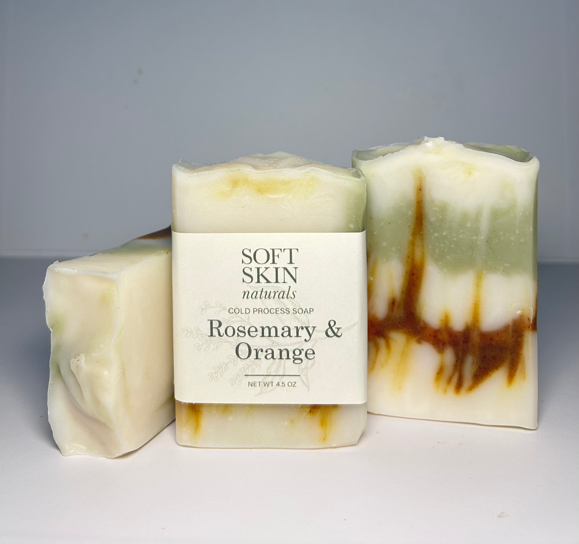Three bars of rosemary and orange soap
