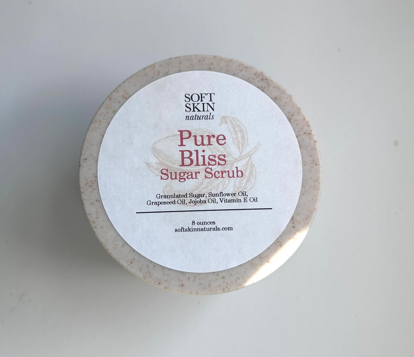 Jar of Soft Skin Naturals Pure Bliss Sugar Scrub on a white background