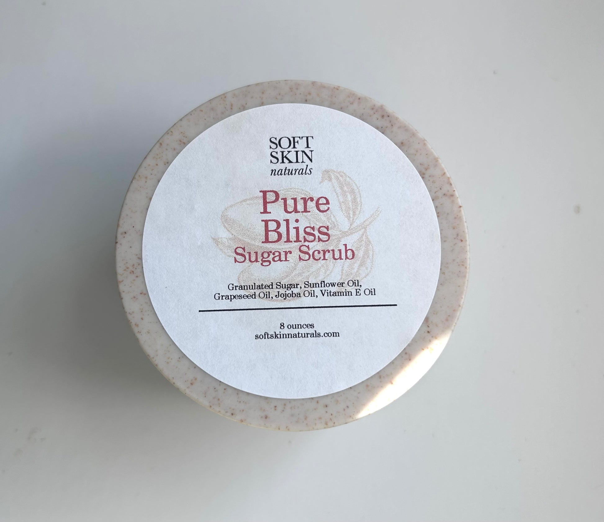 Jar of Soft Skin Naturals Pure Bliss Sugar Scrub on a white background