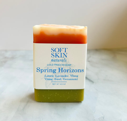 Bar of soap with 'Soft Skin Naturals' label on a marble surface