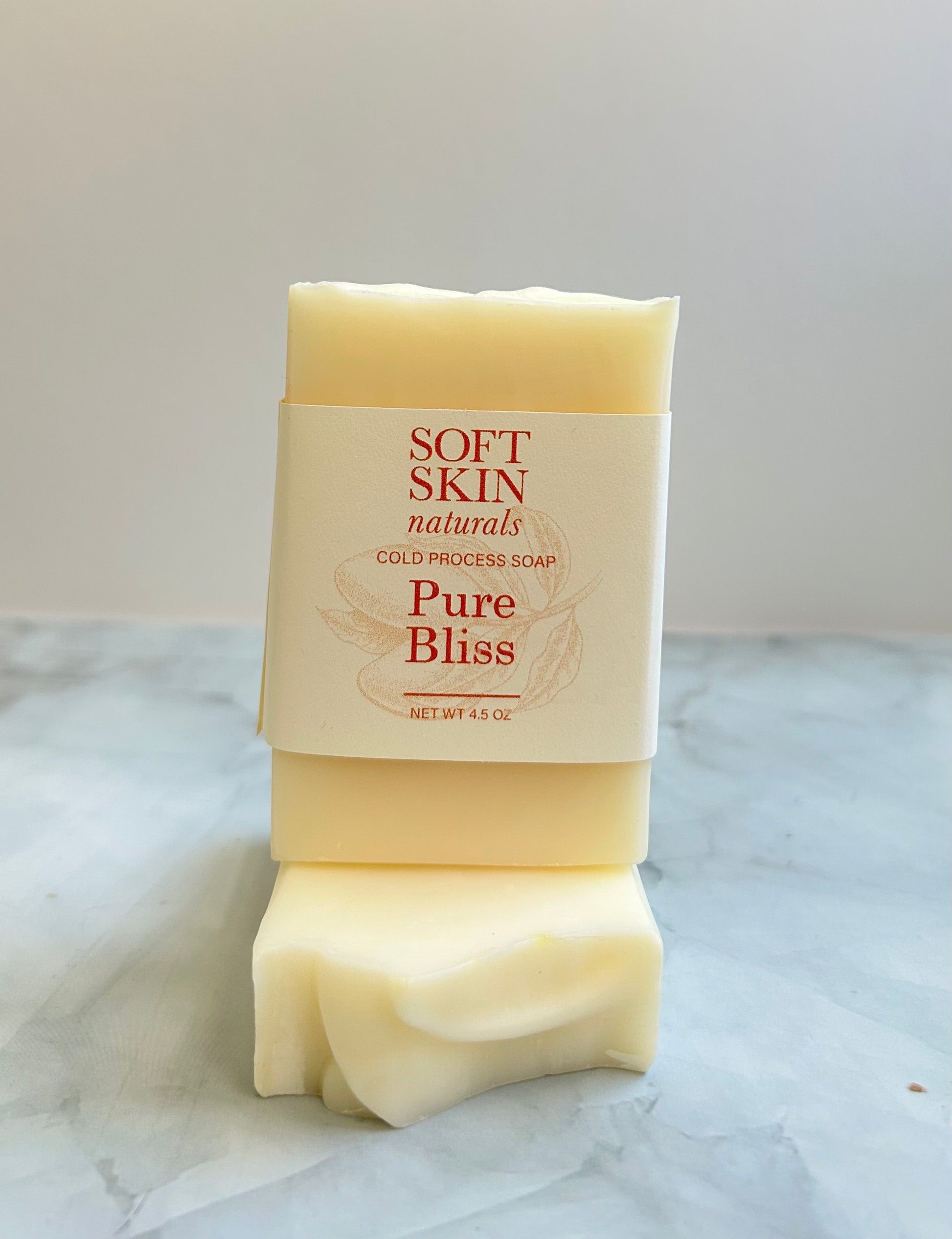 Bar of Soft Skin Naturals Pure Bliss soap on a marble surface